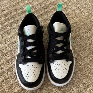 Black and White Sneakers with Green Accents